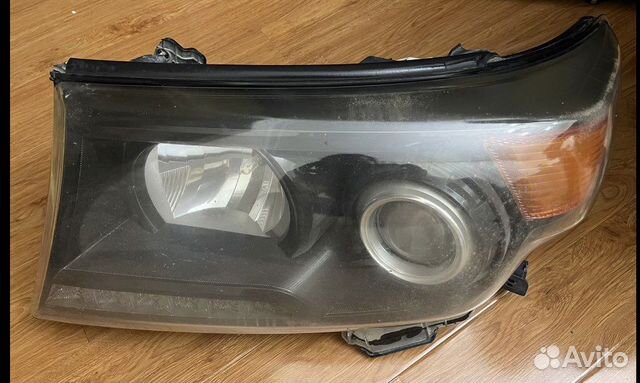 Левая фара LC 200 оригинал