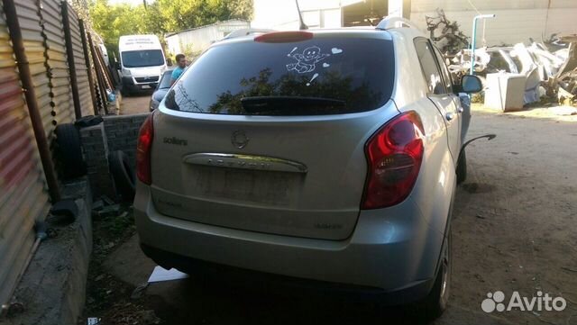 Бампер задний Нью Актион серебро б. у