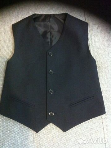Новая жилетка, темно серая, р 30, рост 110 Новая жилетка, темно серая, р 30, рост 110