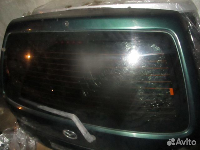 Стекло крышки двери багажника mazda demio 1.3 2001