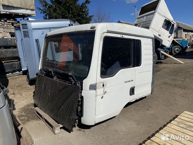 Кабина L низкая узкая MAN TGA D2066LF01 2005 Белая Кабина L низкая узкая MAN TGA D2066LF01 2005 Белая