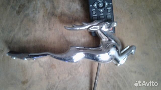 Олень на капот