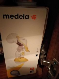 Молокоотсос medela ручной