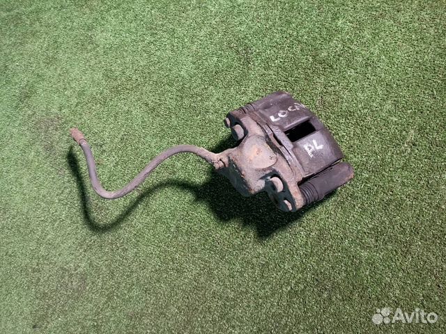 Тормозной суппорт передний левый Renault Logan