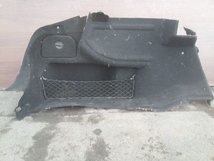 Обшивка багажника левая Mercedes W207