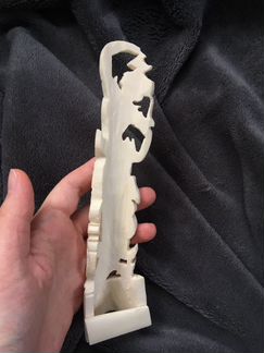 Костяная фигурка резная