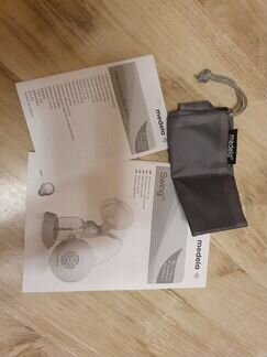 Молокоотсос Medela swing + в подарок 3 бутылочки