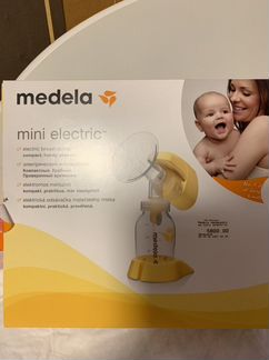 Молокоотсос medela электрический
